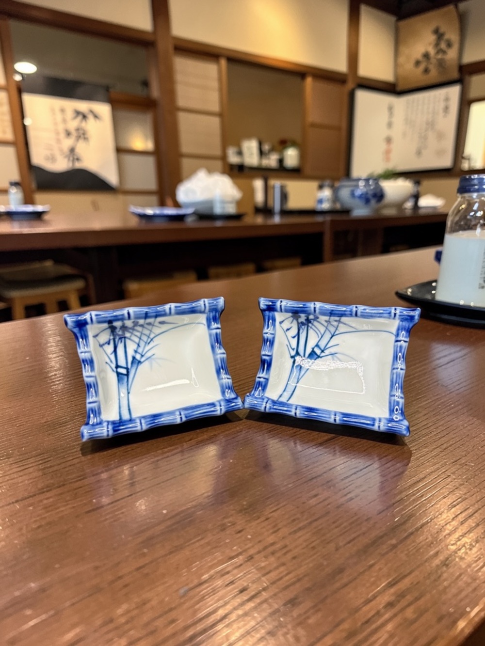 Pair of Vintage Japanese Blue and White ceramic soy sauce dipping dishes.